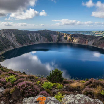 10 Flores Island moments where volcanic crater lakes reflect clouds above Atlantic silence