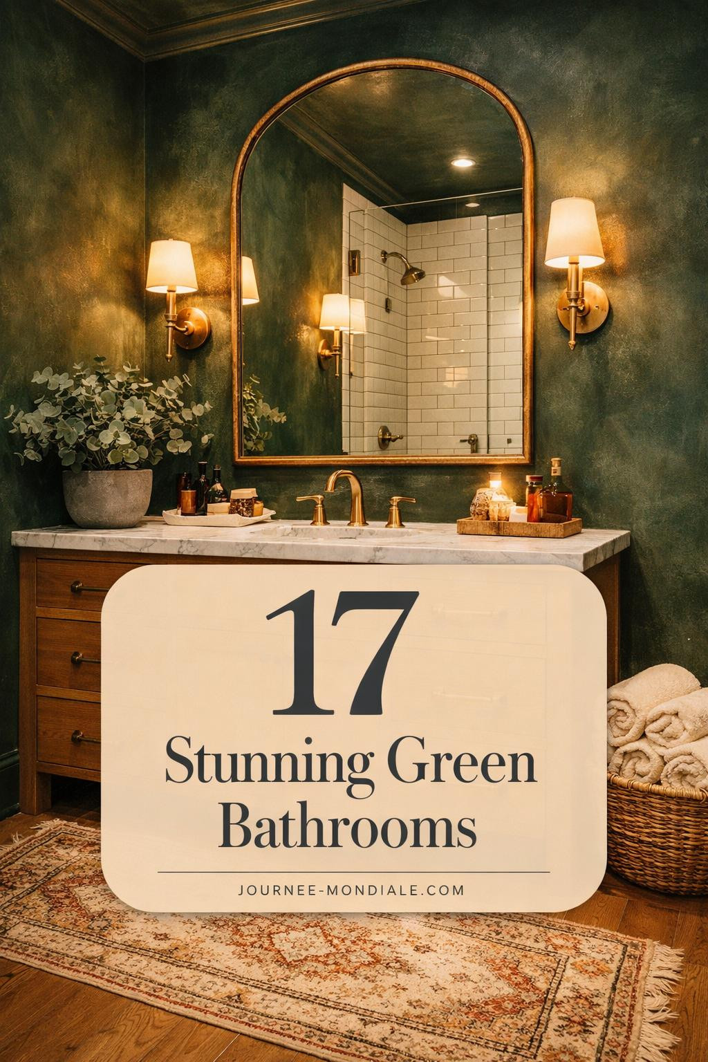 Elegant dark green bathroom interior with custom white oak vanity, honed Carrara marble countertop, unlacquered brass hardware, deep forest green Venetian plaster walls, polished brass sconces, frameless glass shower with subway tiles, vintage runner on oak flooring, and arched mirror reflecting warm lighting.