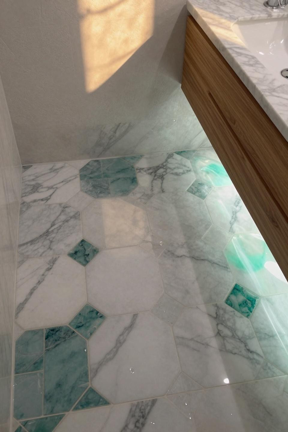 Small Bathroom Interior - Calacatta marble hexagons with teal zellige accents
