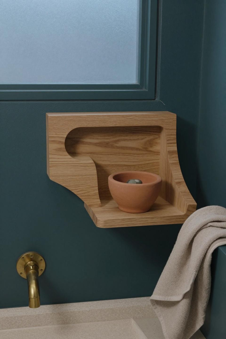 Organic bathroom design - micro-minimalist olive wood shelf with terracotta