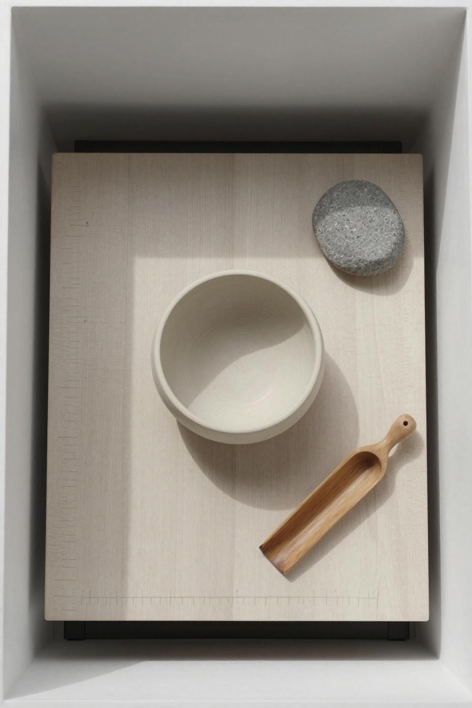 Japandi kitchen island - ash butcher block counter floating above minimalist steel frame