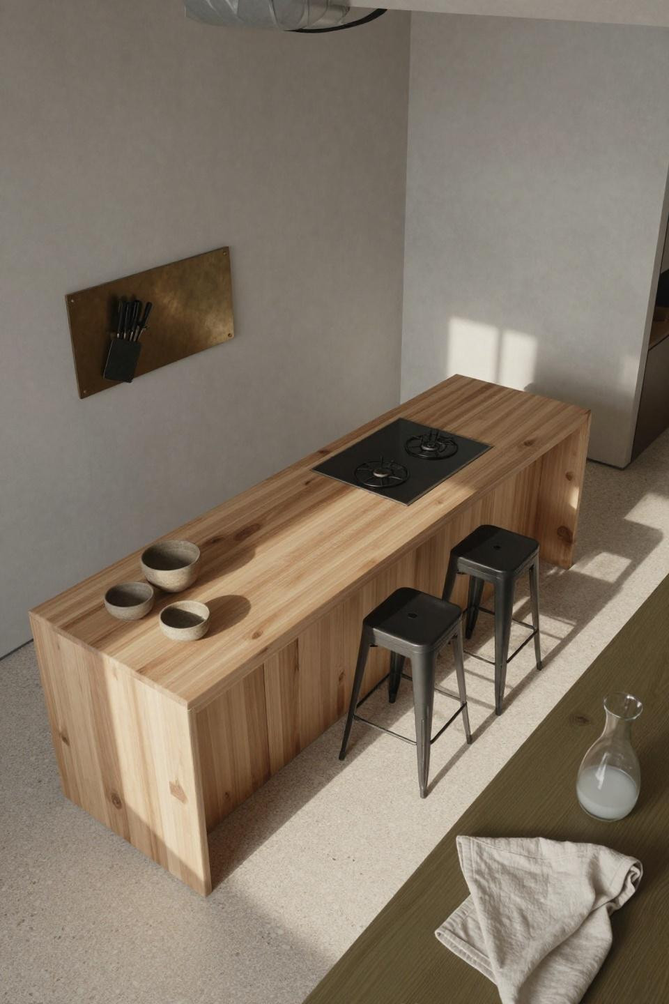 Modern minimalist kitchen - raw timber island with integrated cooktop and exposed exhaust ducting