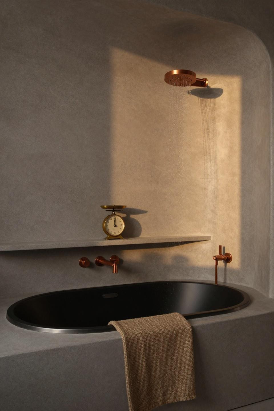 microcement kitchen - pale greige curved niche with black soaking tub