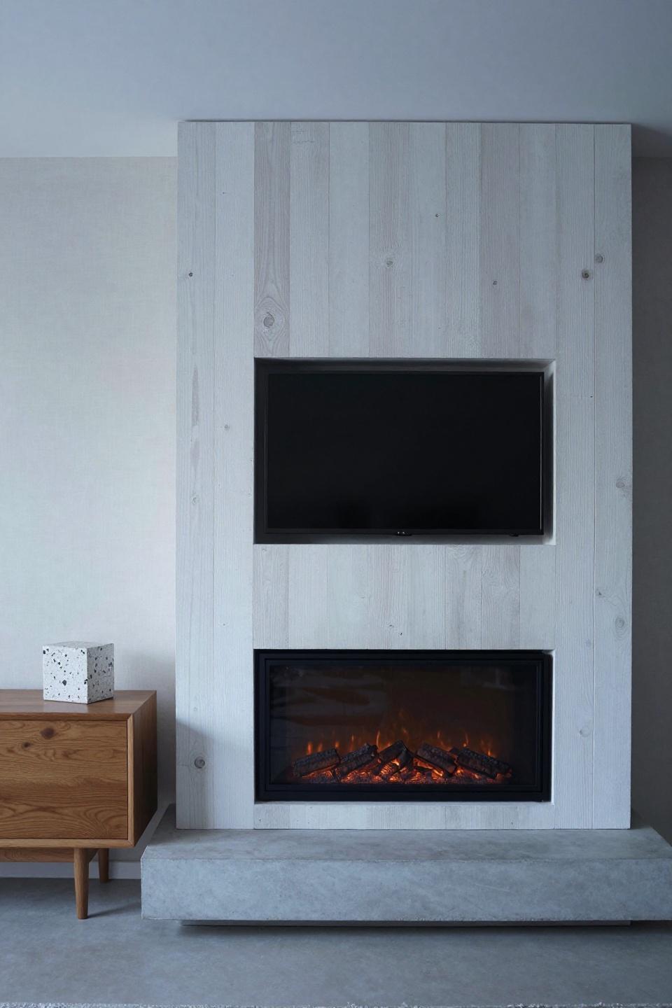 Fire And Tv Wall Built Ins - floating concrete platform whitewashed timber