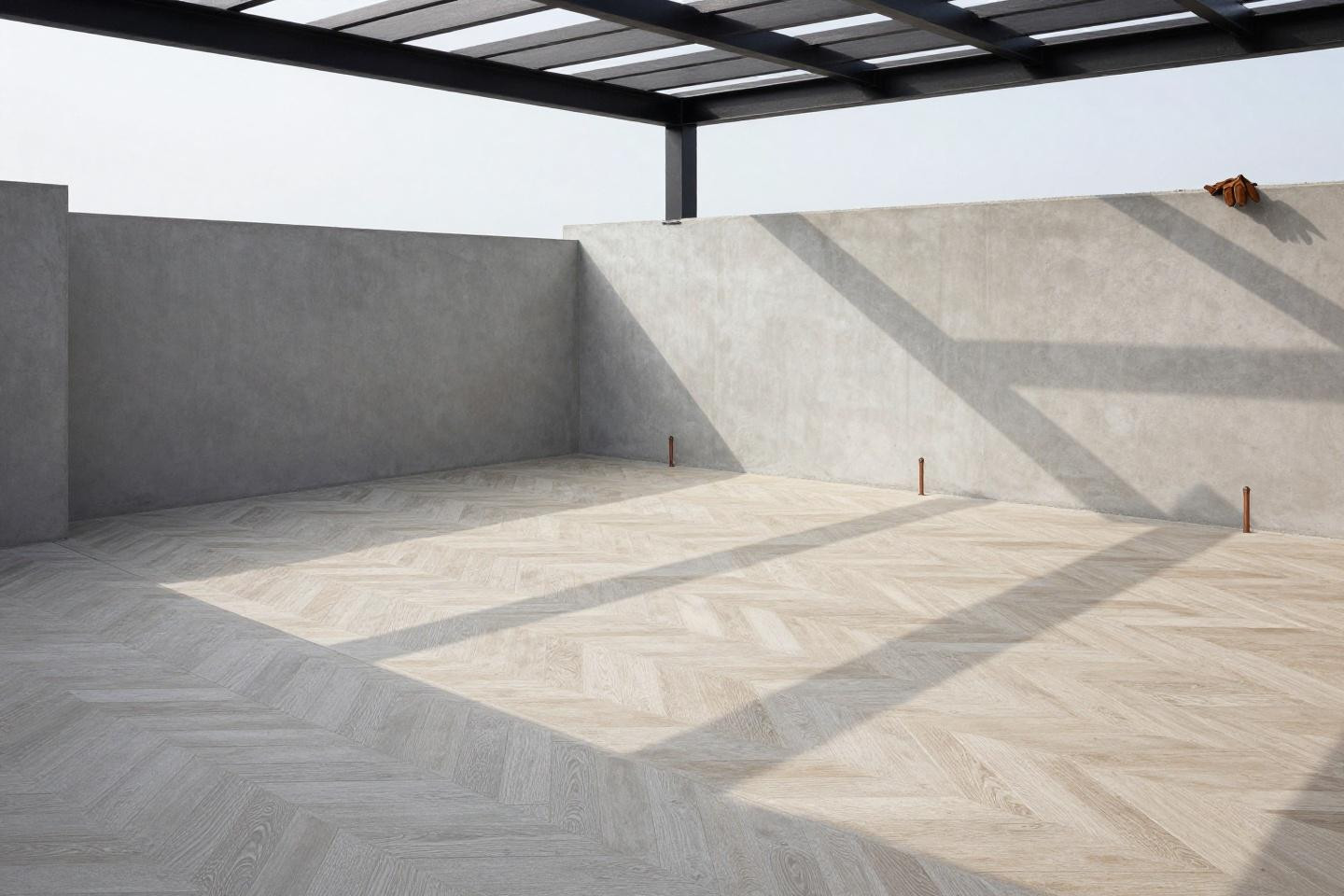 Minimalist herringbone stamped concrete patio in sand tones