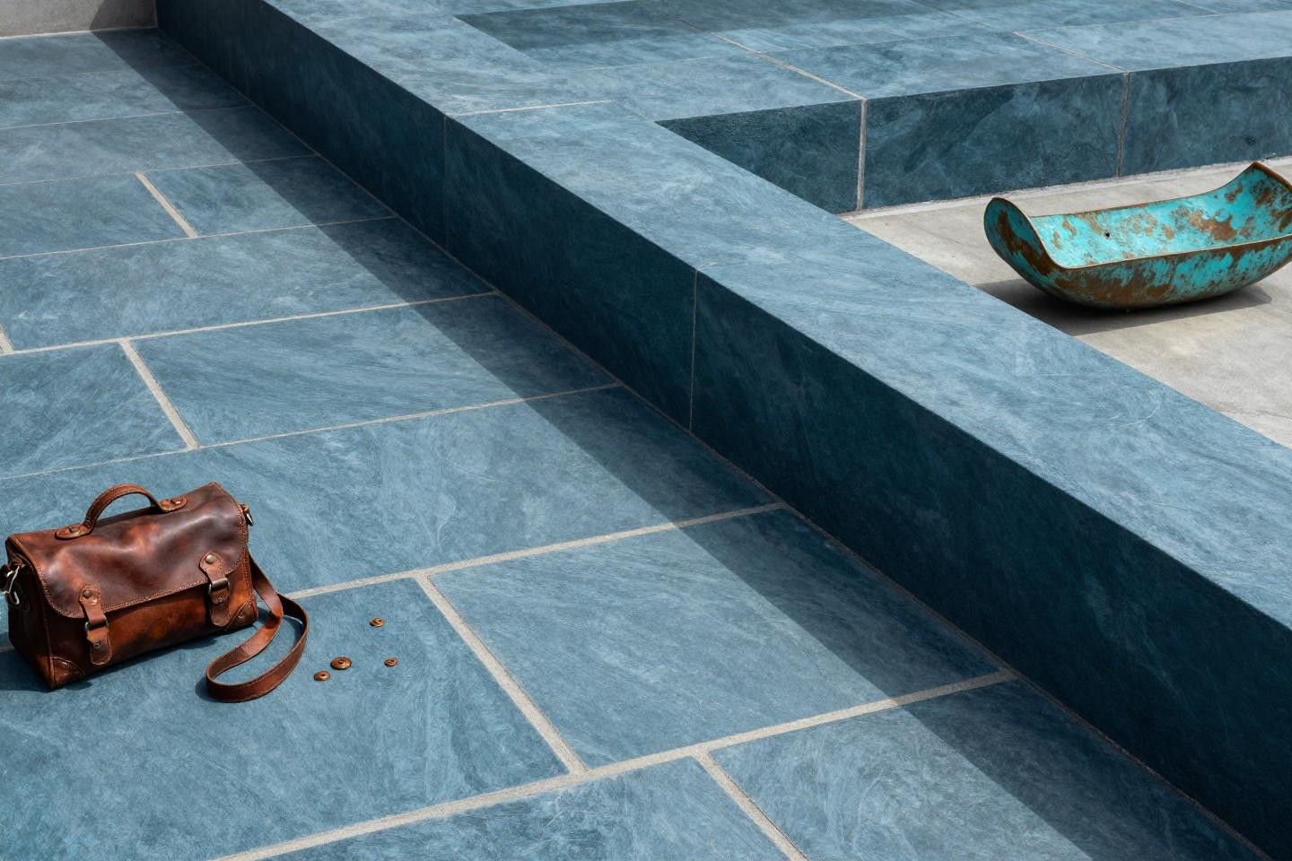 Contemporary teal stamped concrete patio ashlar pattern