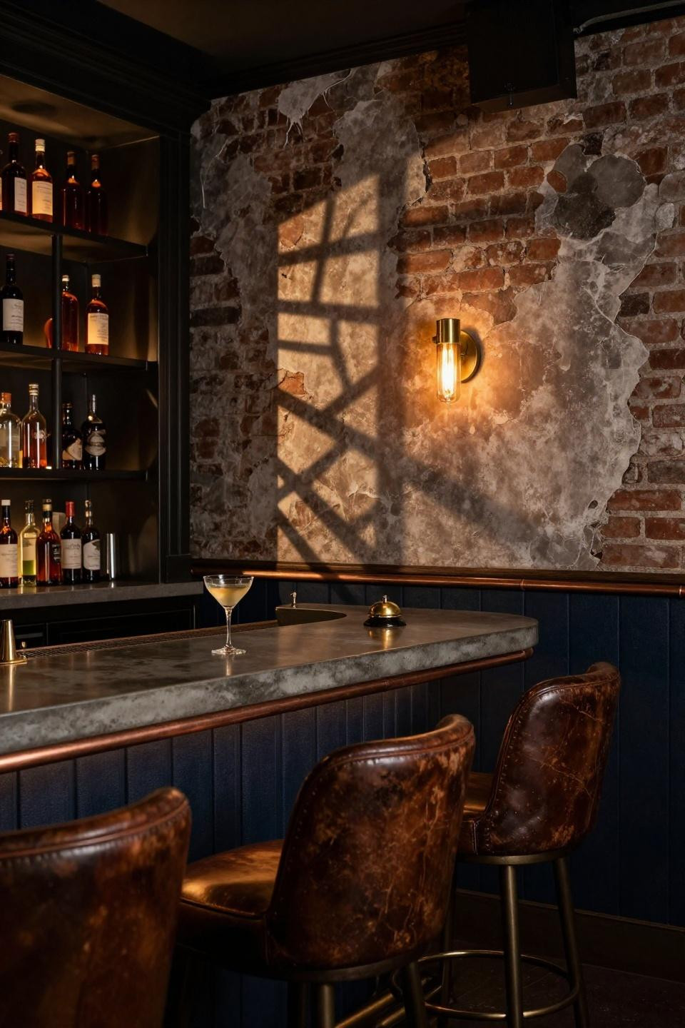 Dark Bar Aesthetic - blackened steel shelving with backlit amber bottles