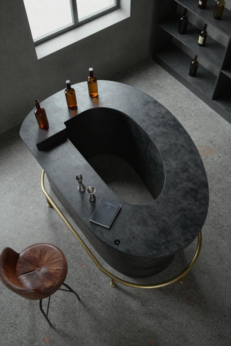 Dark Bar Aesthetic - black steel horseshoe bar with copper terrazzo