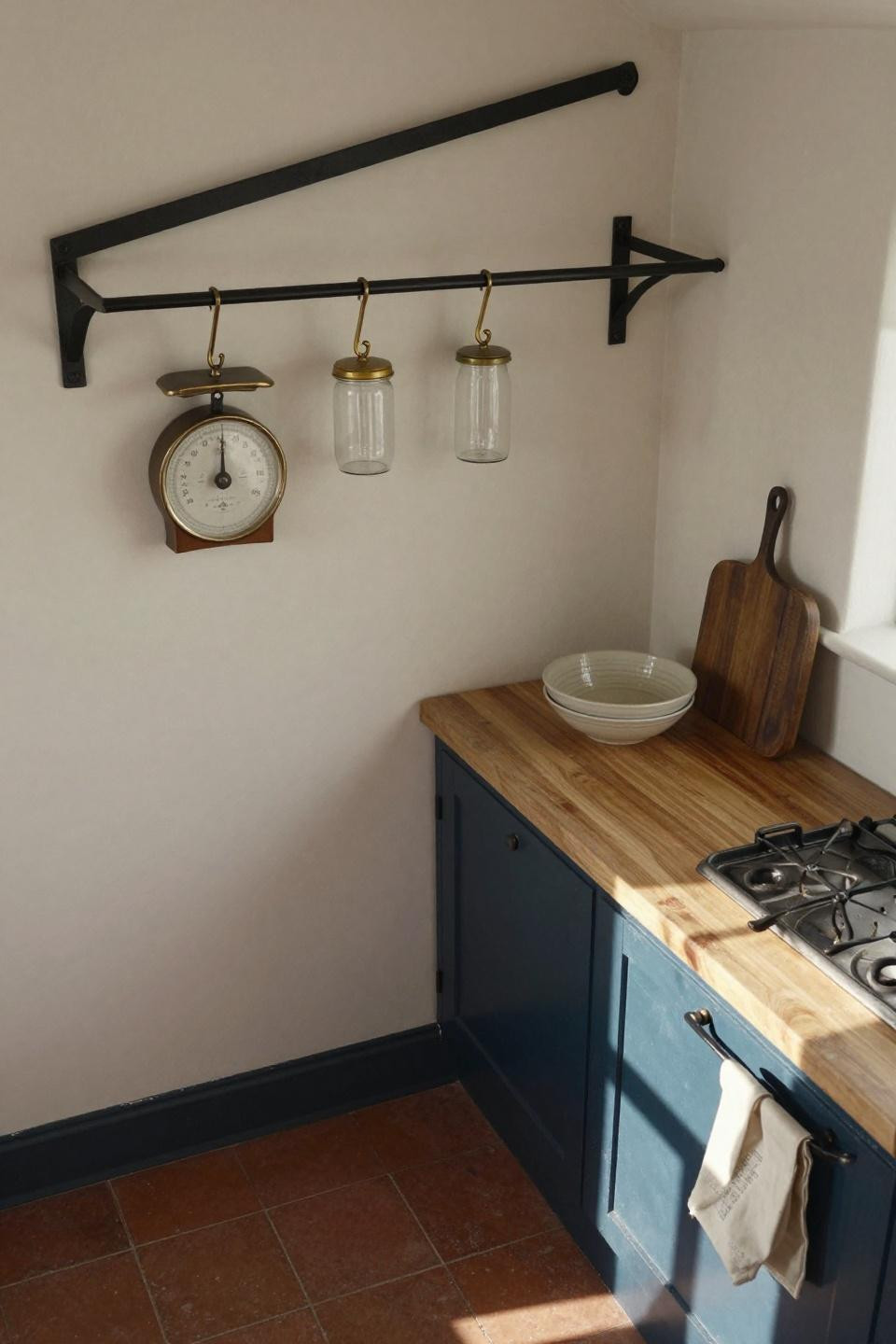 Cottage Kitchen - navy galley with blackened steel rail