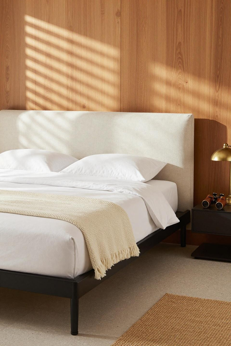 Cozy Neutral Bedroom - blackened steel cantilever frame with oak accent wall