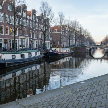 9 Amsterdam neighborhoods where locals bike past houseboats and no cruise ships dock