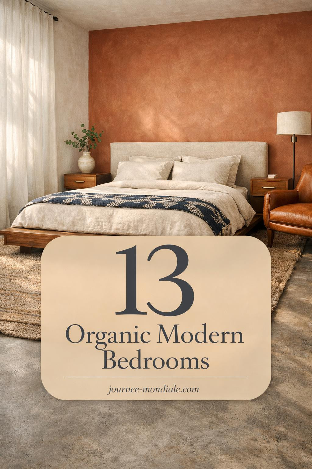 Serene organic modern bedroom featuring walnut platform bed, cream linen bedding, terracotta accent wall, jute rug, and natural light through sheer curtains