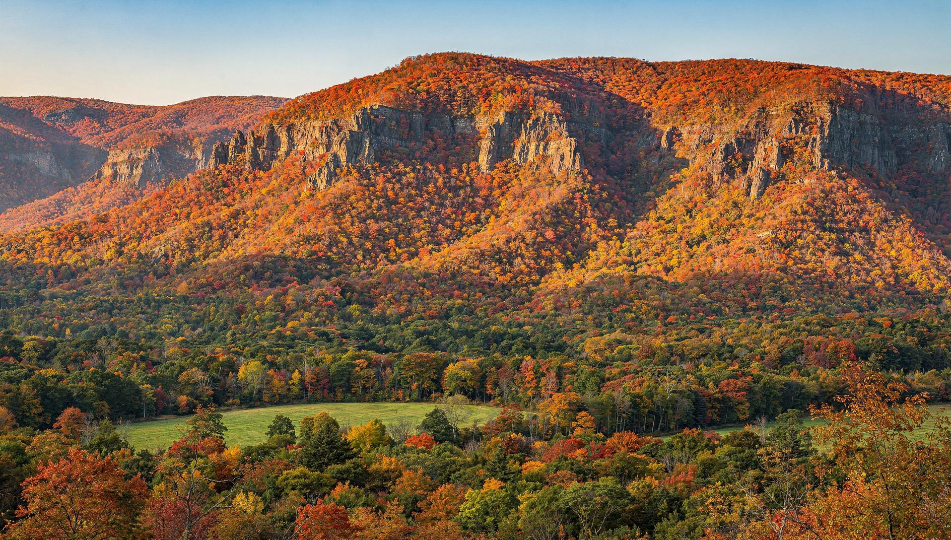The Catskills peak for 10 days in early October and the ridges turn a week before the valley