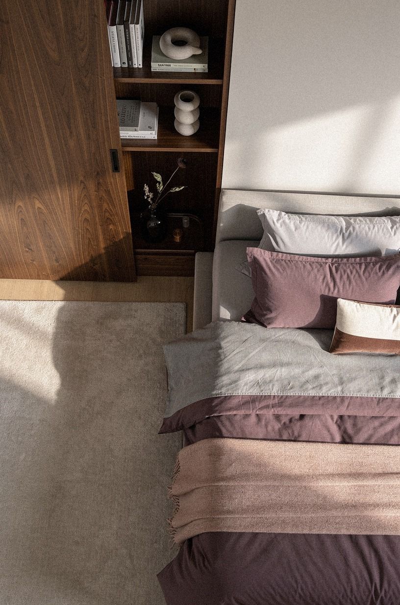 Frame a bookcase door beside the bed