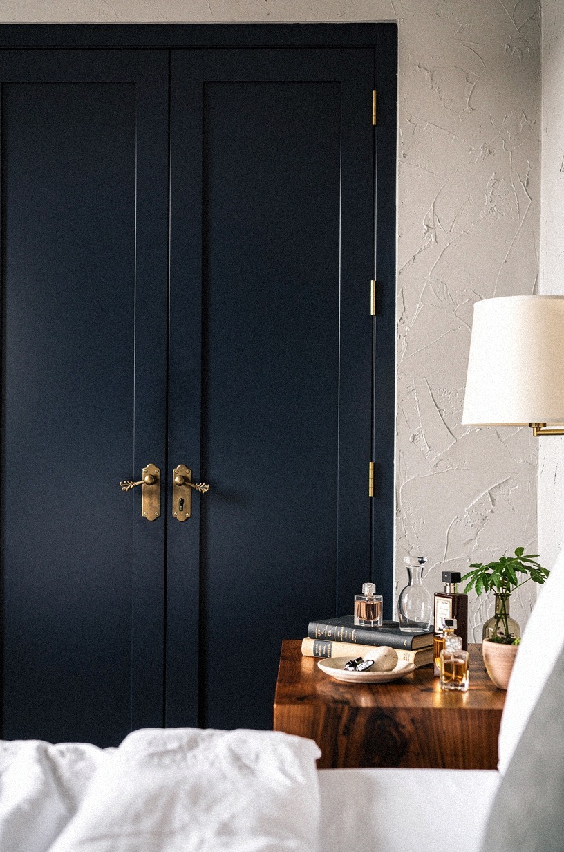 Style closed doors with books and perfume