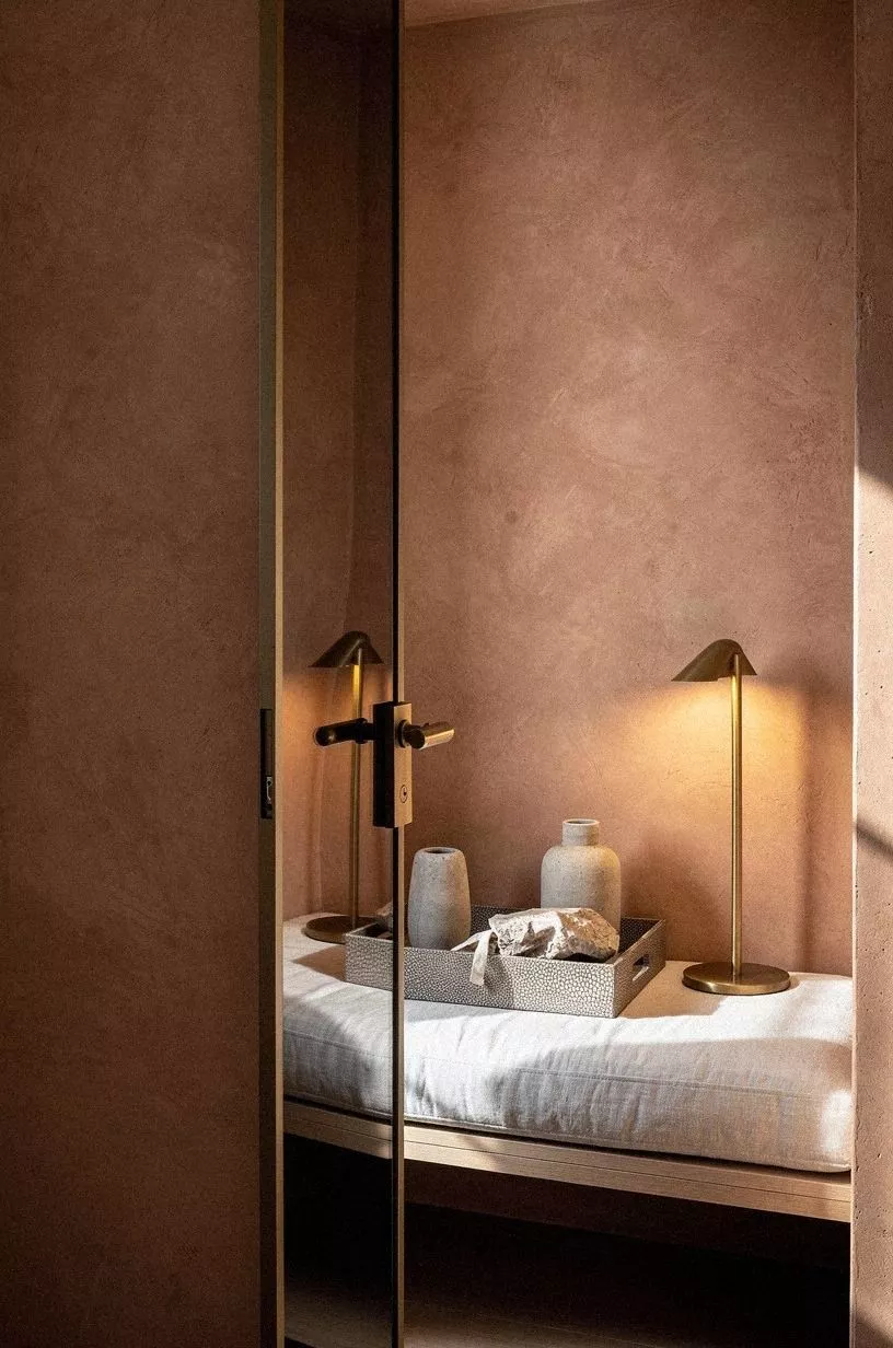 Install a mirror panel with touch-latch seams