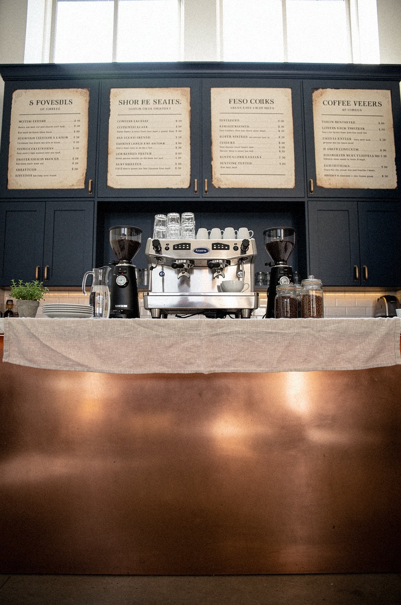 Hang vintage menu boards over the bar