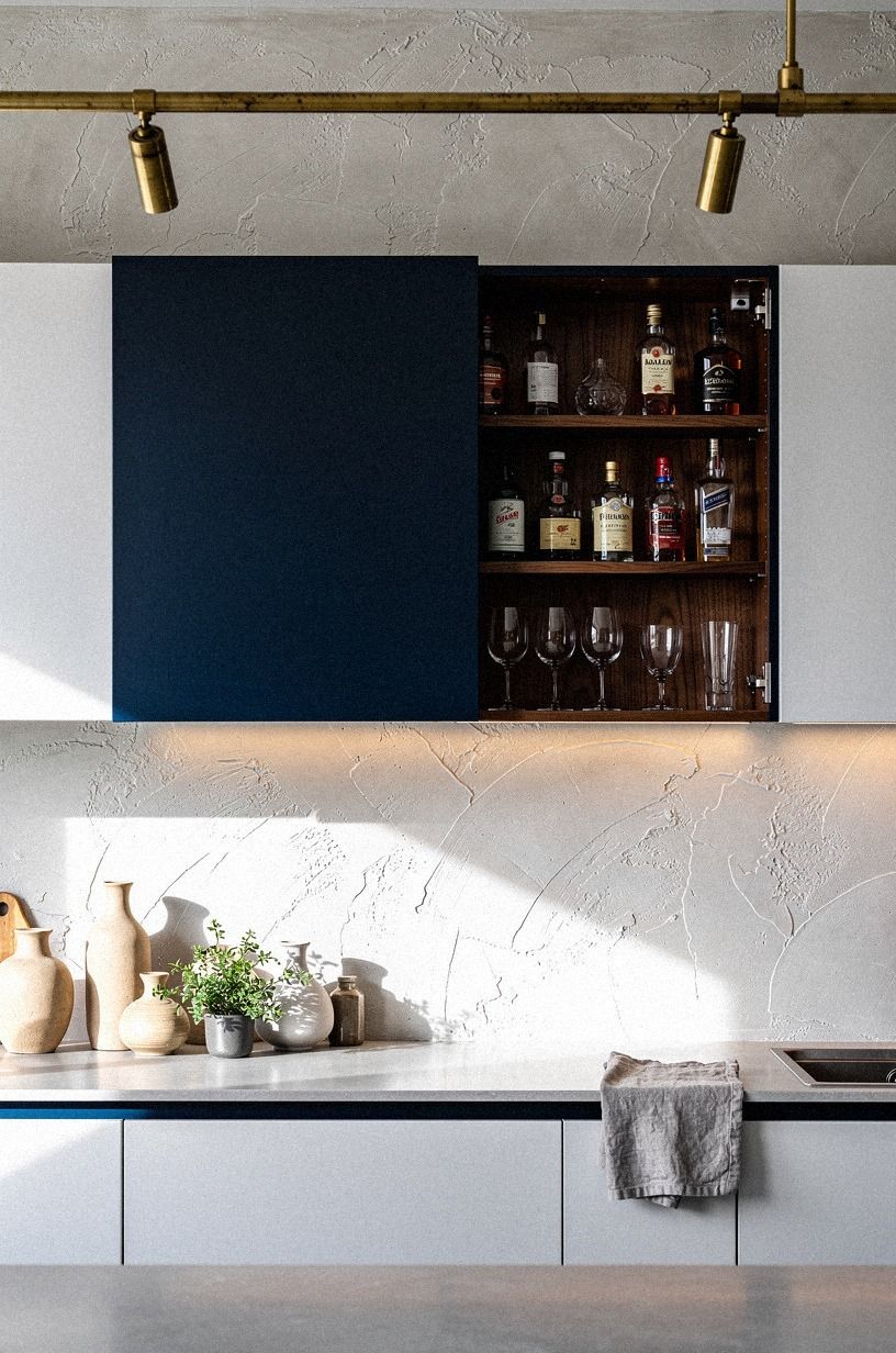 Slide a backsplash panel over the bar