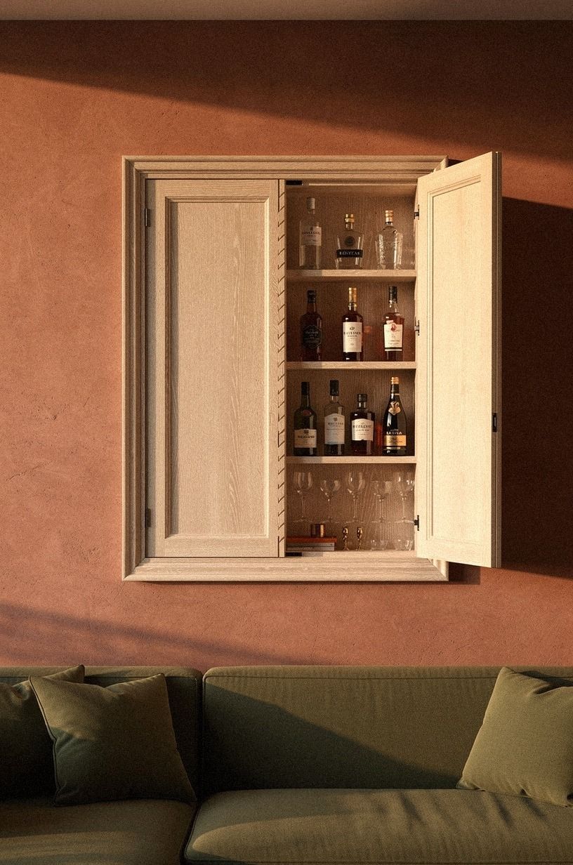 Build a hidden liquor cabinet behind picture-frame moulding