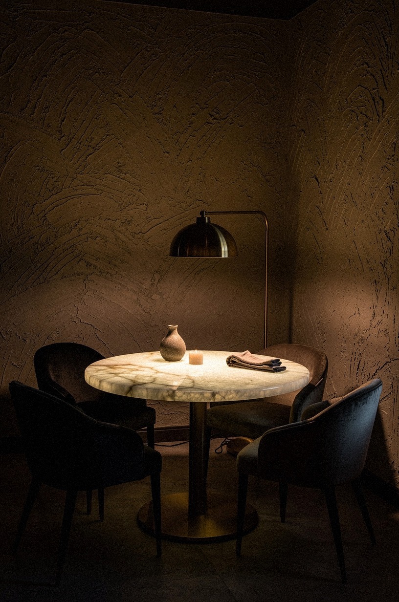 Float a round table between velvet chairs