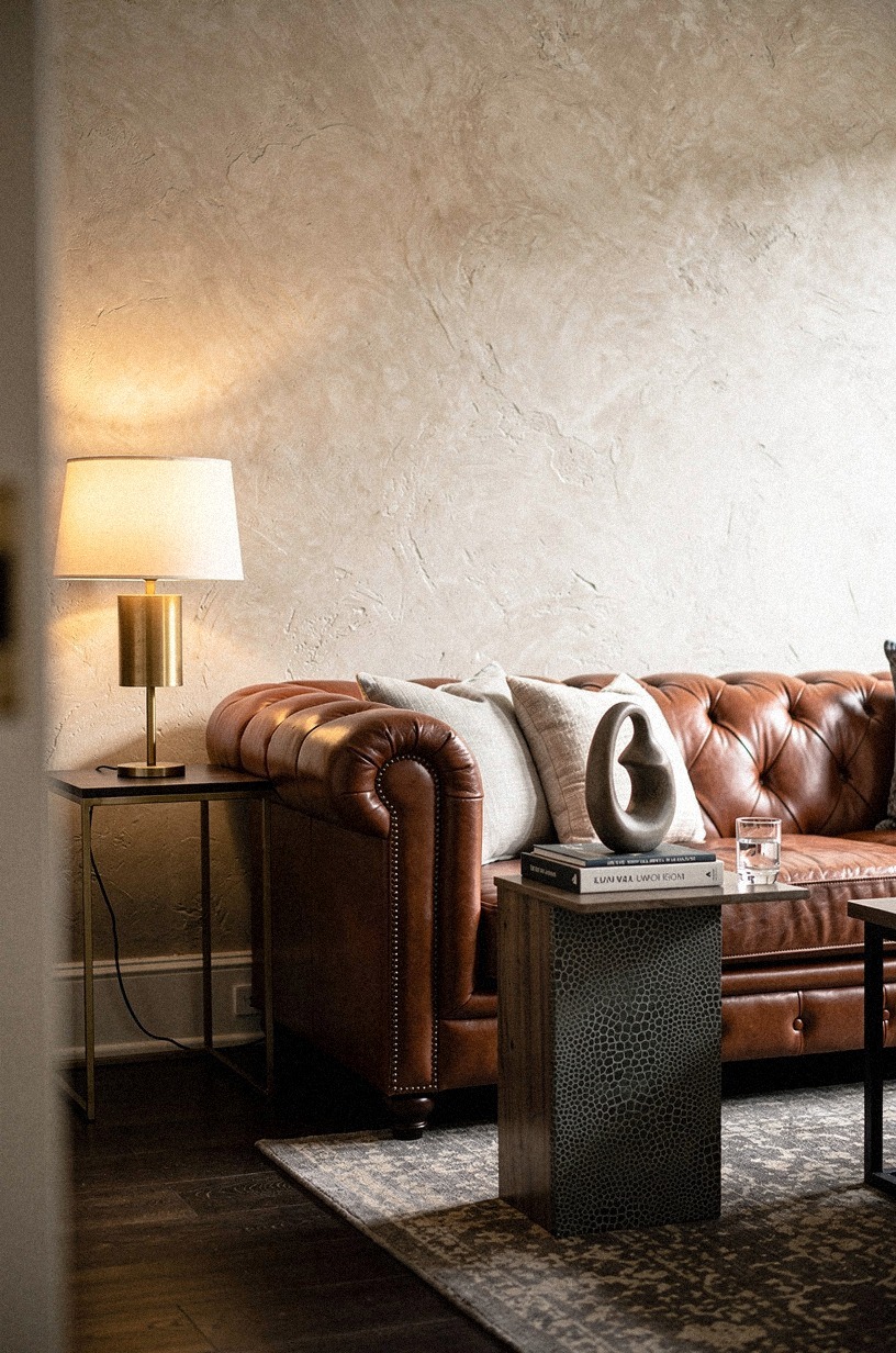 Anchor seating around a tufted leather sofa