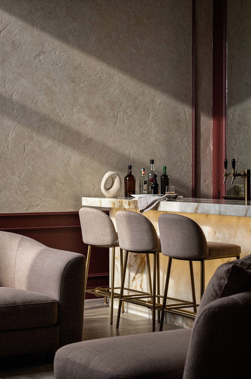 Anchor the bar with oxblood trim