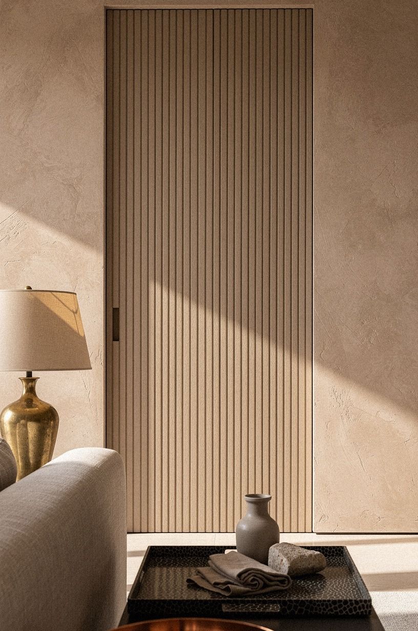 Conceal the entrance with fluted paneling