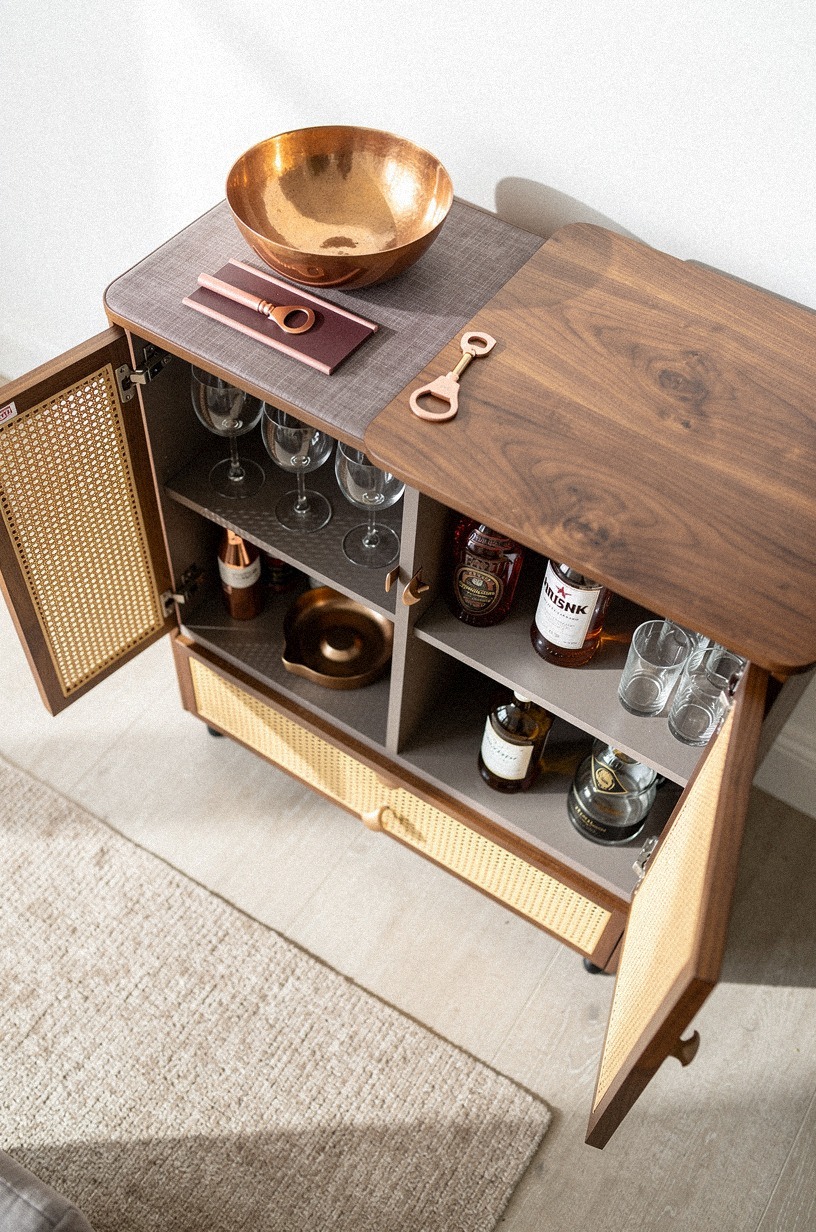 Hide glassware behind woven console doors