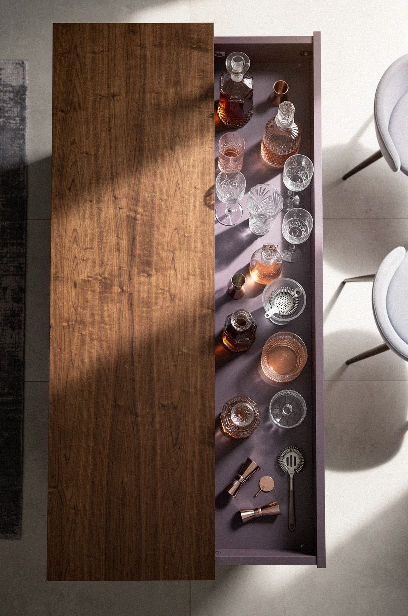 Convert a tall sideboard into a hidden drinks station