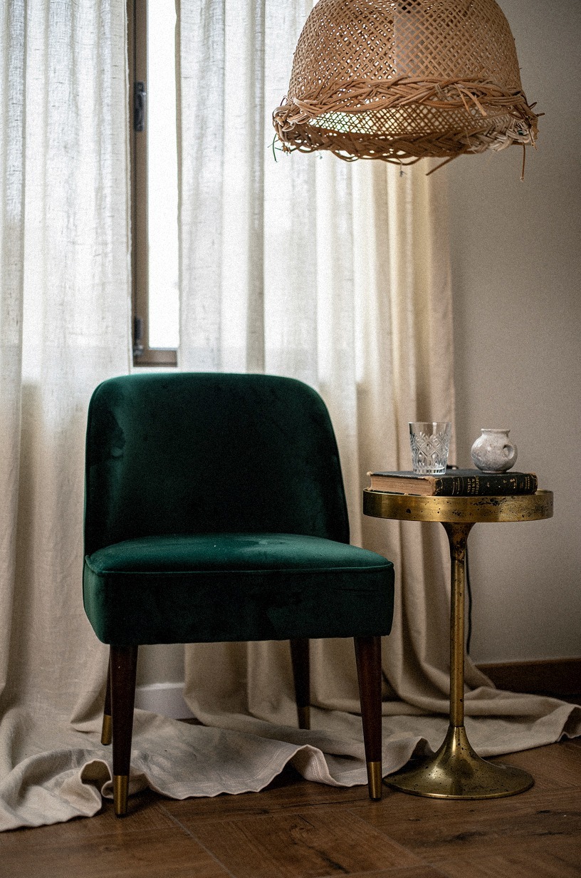 I added a velvet slipper chair by the window