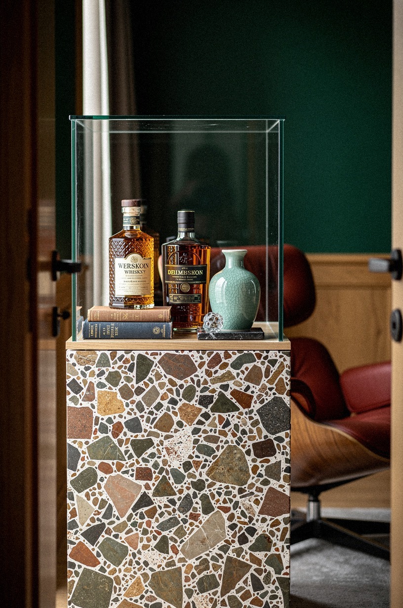 Stage decanters inside a glass vitrine