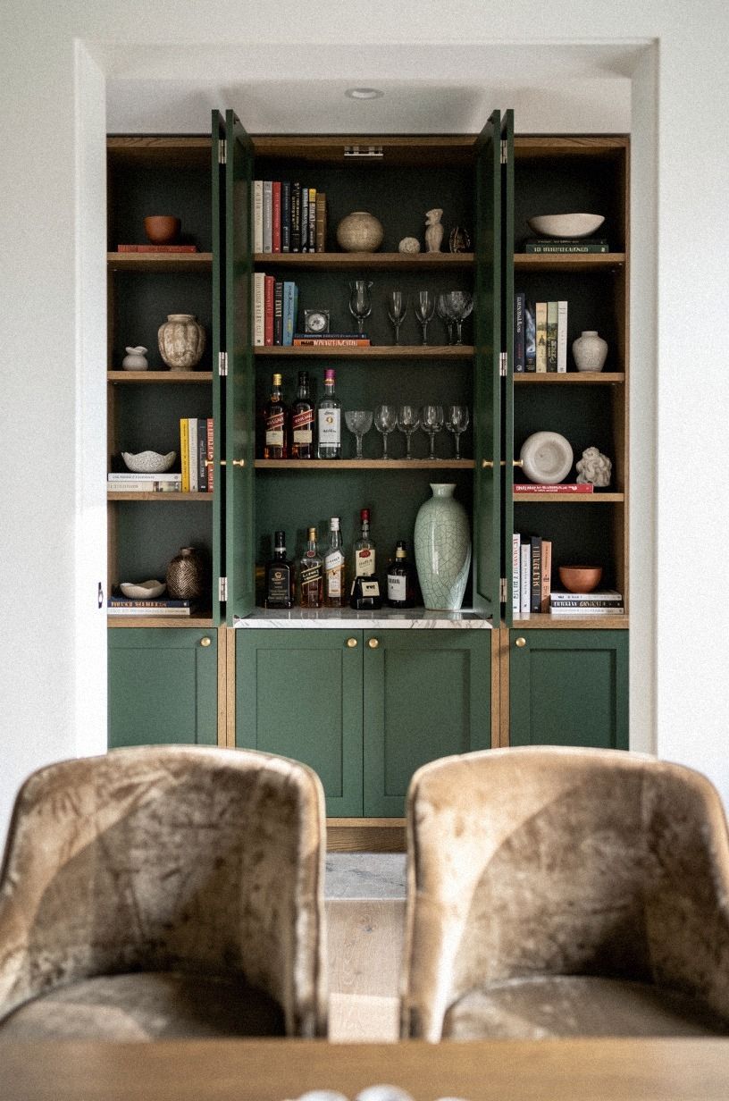 Sink a bar cabinet into built-in bookcases