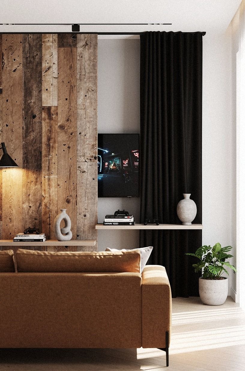 Add blackout curtains behind the sofa wall