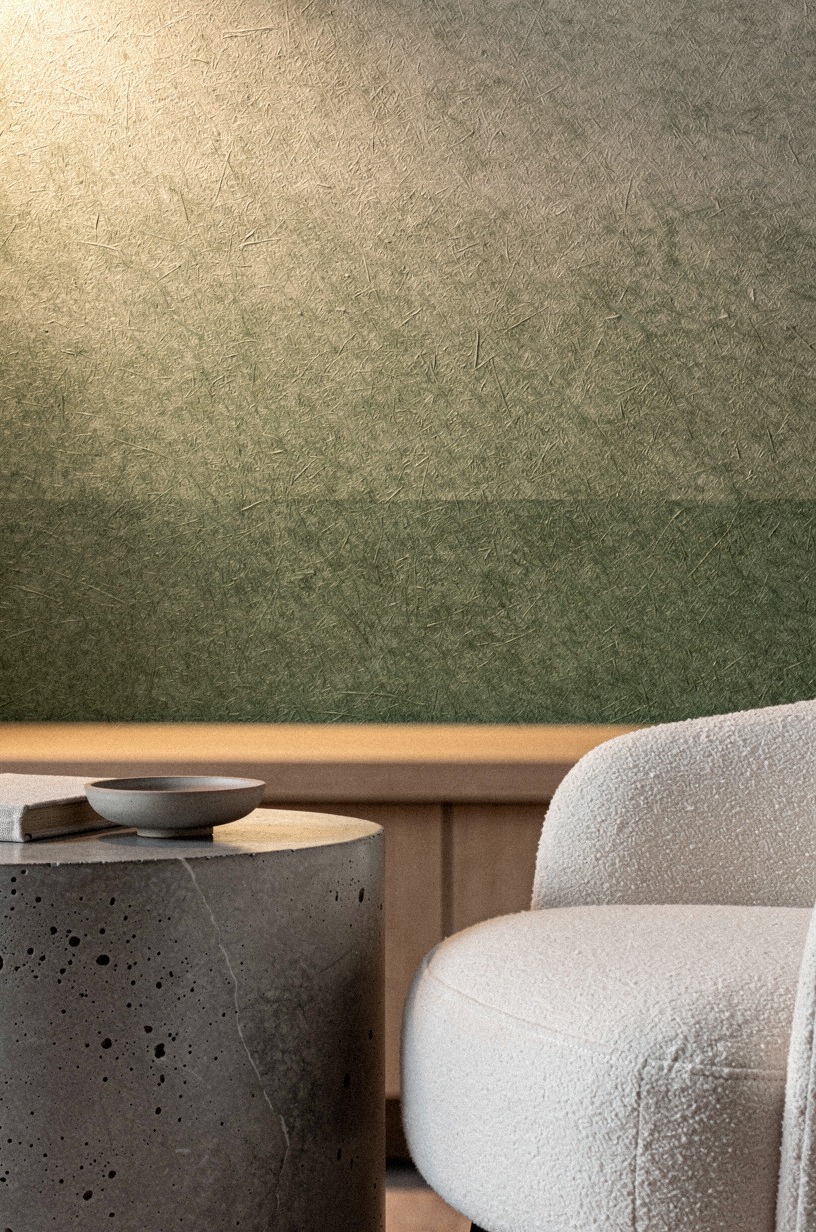 Build a moody mural behind club chairs