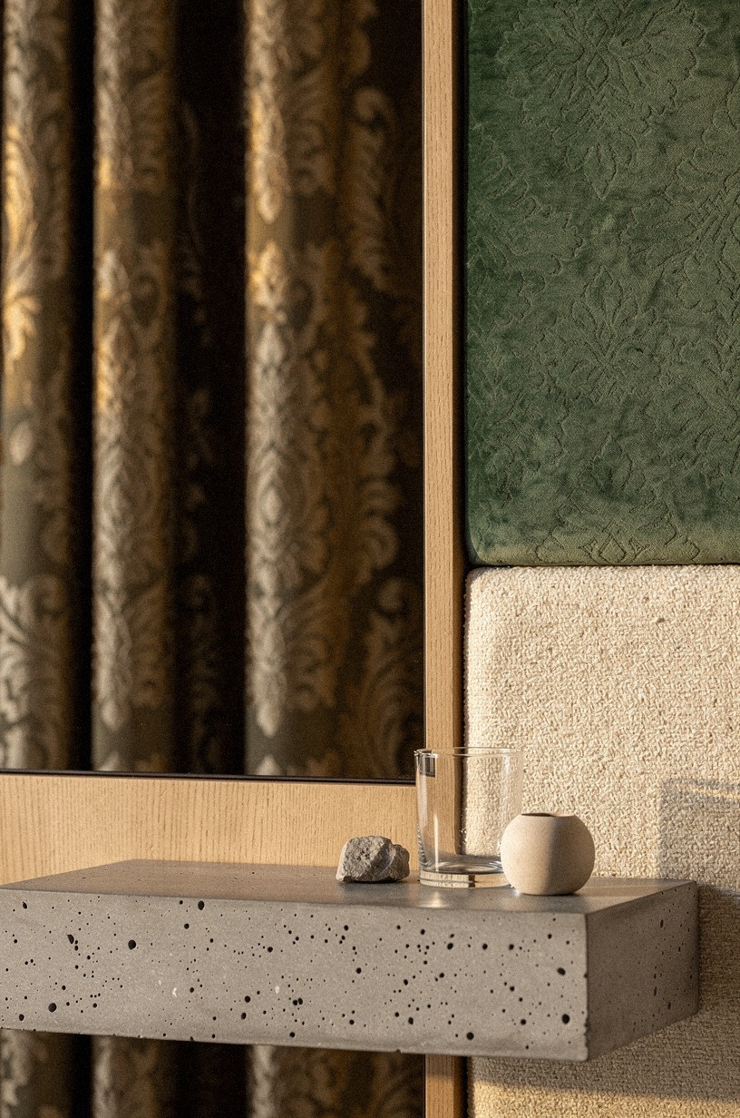 Pair sage damask drapes with smoked mirror accents