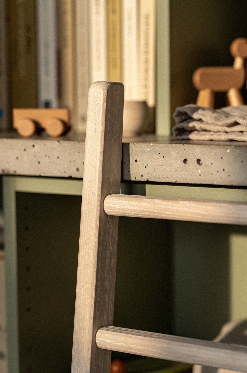 Tuck floor cushions inside a fireplace alcove