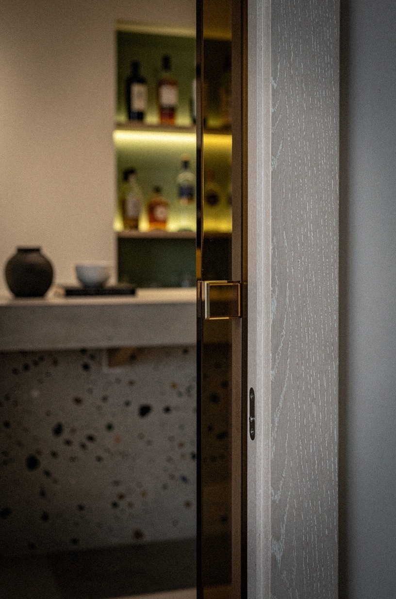 Frame a secret doorway in smoky glass (What if the glass only hinted?)