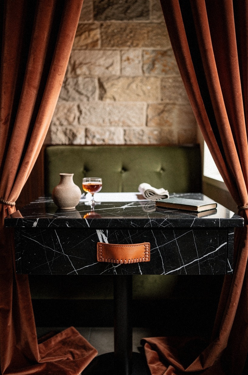Frame the dining corner with velvet drapes