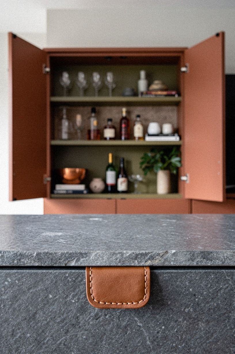 Mask a dry bar inside the TV cabinet