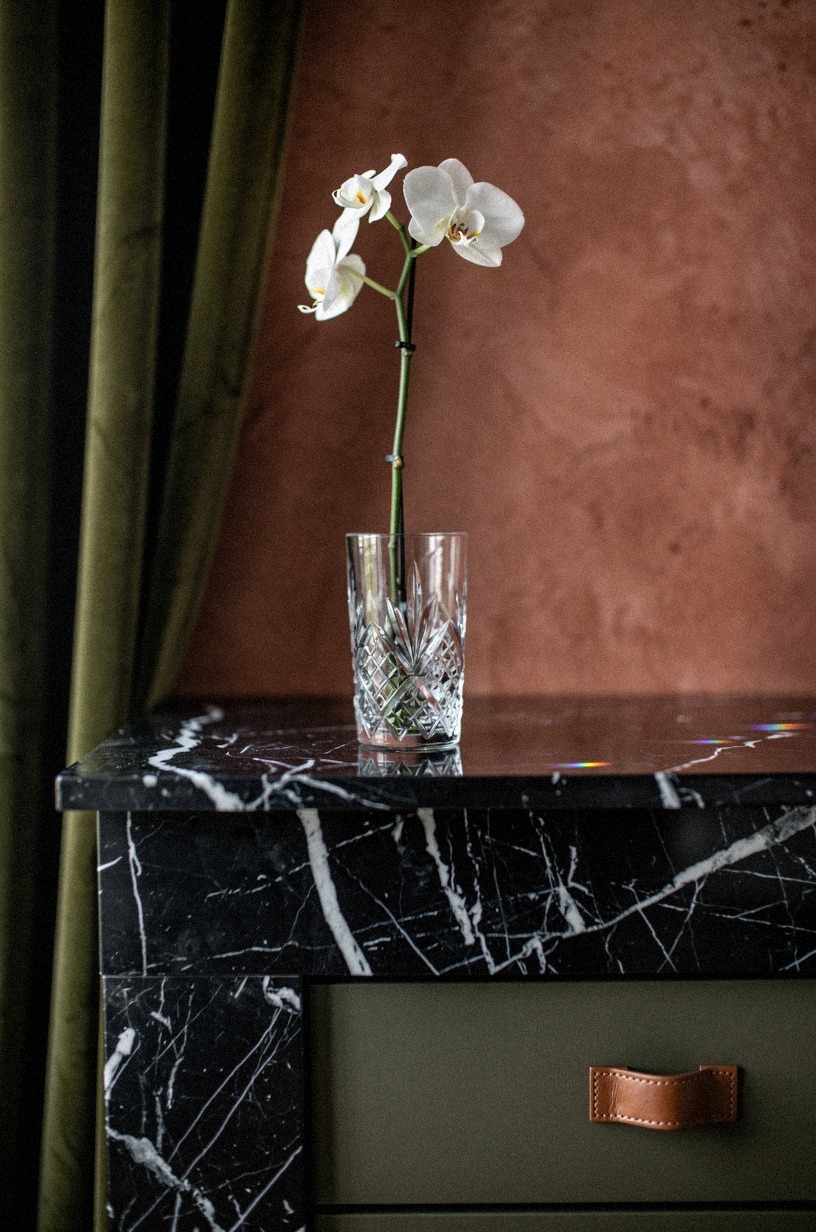 Set a Single Orchid in a Cut-Crystal Highball on the Mantel