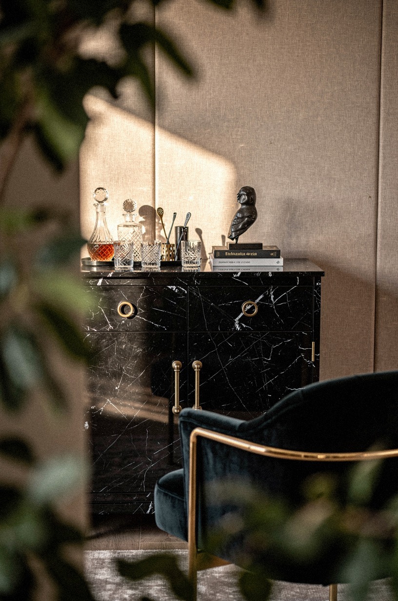 Choose a black marble bar cabinet over wood