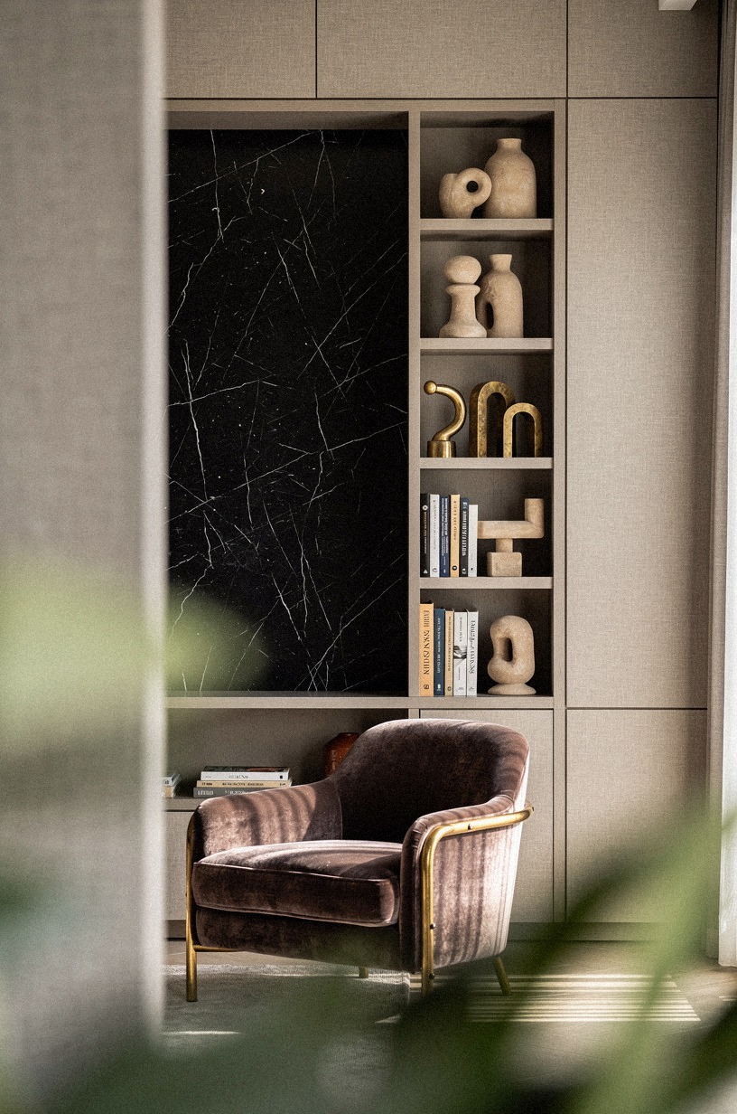 Inset black marble paper behind bookshelves