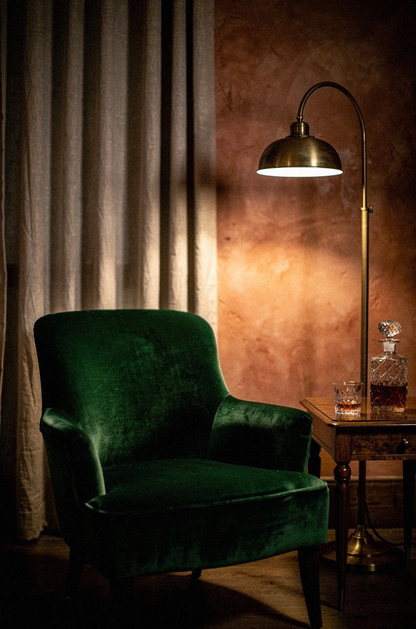 Upholster an accent chair in emerald green mohair
