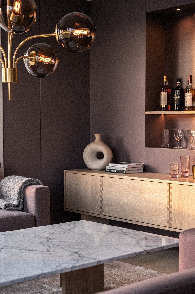 Hang a smoked-glass chandelier with gold arms