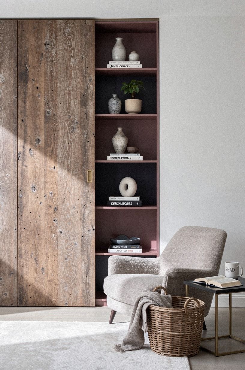 Stage a reading chair beside the disguised opening