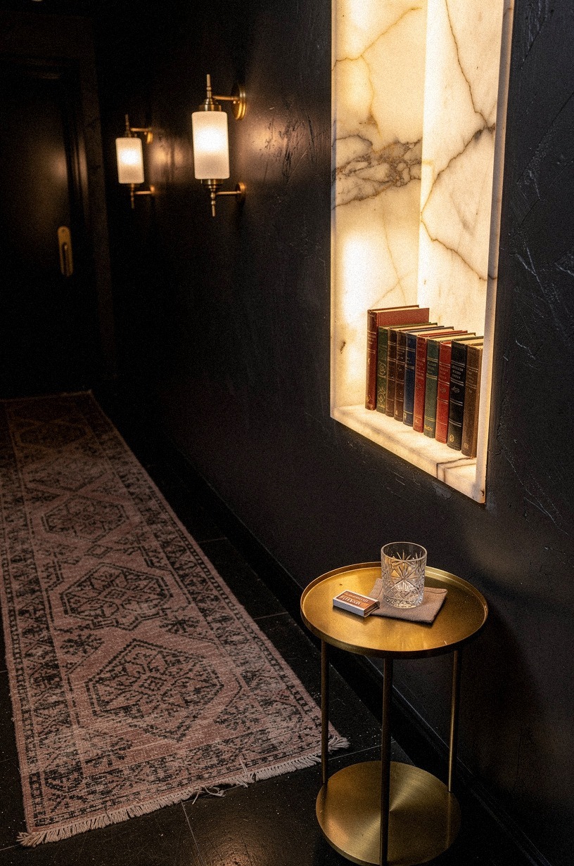 Lay a Persian runner along a dark-walled hallway nook
