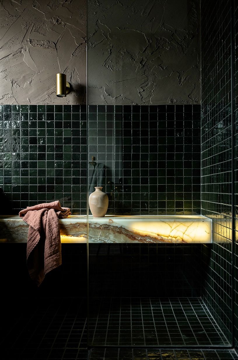 Wrap the shower in glossy black zellige