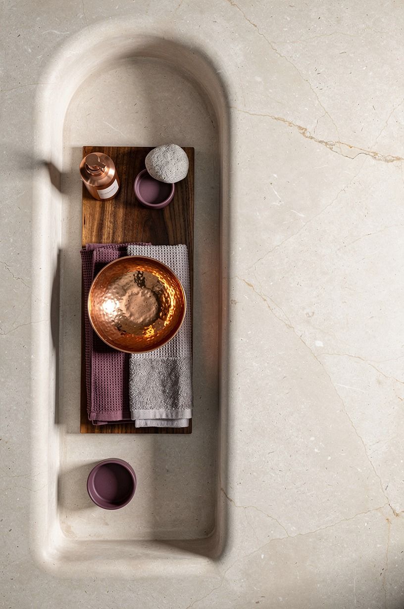 Install an arched shower niche in microcement