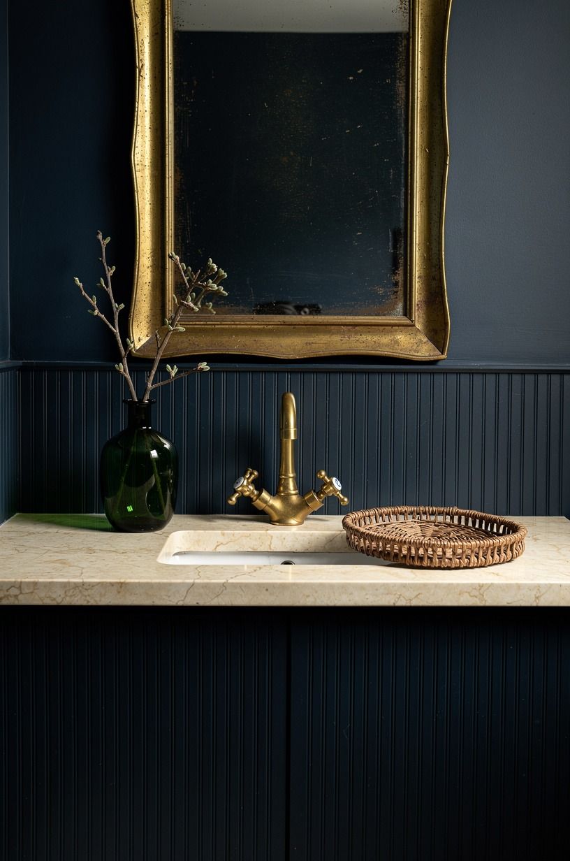 Paint beadboard deep blue below marble