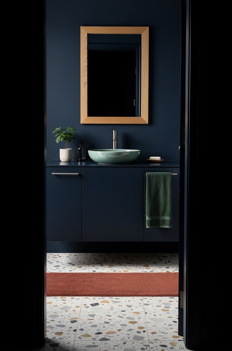 Anchor patterned floors with midnight cabinetry